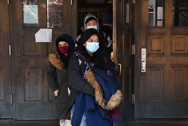 Students wearing coats leaving Brooklyn Tech in Brooklyn